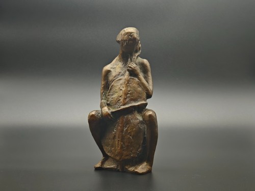 Bronze musiker cello spieler - bronze,