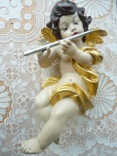 Großer Engel, Putto