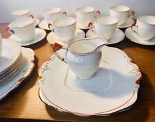 28 teiliges Vintage Teeservice Art Deco Sutherland Bone China orange vergoldet & weiß sehr guter Zustand