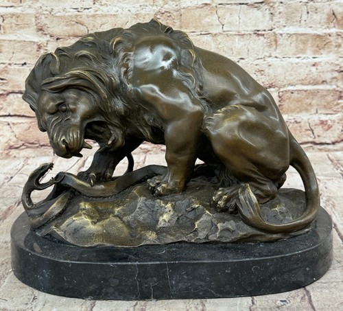 Bronze löwe und - und, schlange