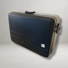 Vintage Hartschalenkoffer auf Rollen – Retro Reisegepäck