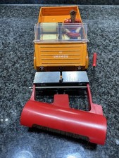 Tippco Unimog mit Kehrmaschine