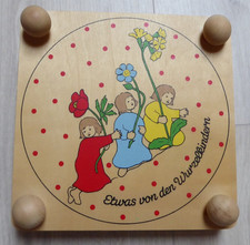 Wurzelkinder-Blumenpresse -