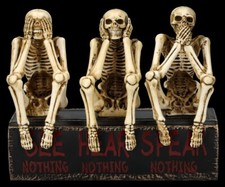 Skelett Figuren auf Buch -