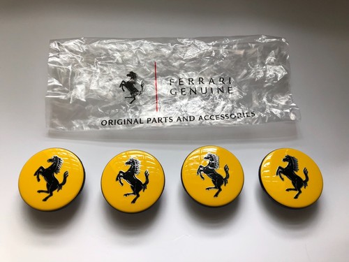Neu orig ferrari nabenkappe - 4x,