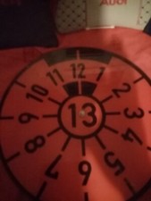 wanduhr in Form einer