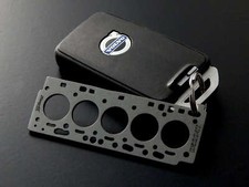 Schlüsselanhänger Miniatur einer Kopfdichtung für Volvo D5204T - made in Germany