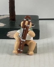 2709/25 Sitzender Engel mit