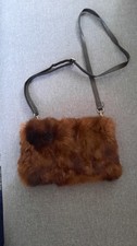 Handmuff aus Fell, braun mit
