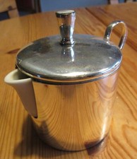 Thermo - Kanne, 1960 er Jahre: Porzellan + Nirosta-Metall , Höhe 10 cm