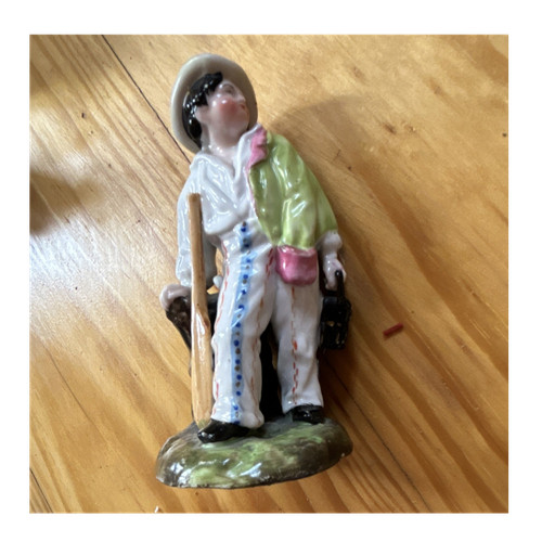 Porzellanfigur mann mit paddel - porzellanfigur,