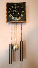 Kleine Wanduhr Gold-Schwarz