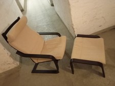 Sessel und Hocker Poäng von Ikea, schwarz-braunes Holz, Bezug Hillared Beige