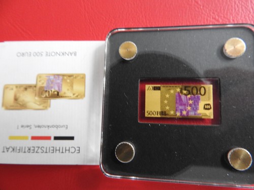 Banknoten auf goldbarren - banknoten,