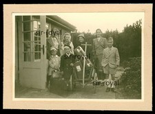 Family next to handcart with