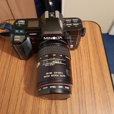 Minolta 7000, Analog Spiegelreflexkamera,  incl. Tasche und Blitzlicht.