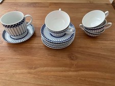 Alt Friesland Teetassen mit Untertassen sowie ein Kaffeebecher, gebraucht