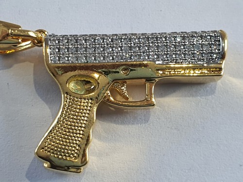 Iced out golden revolver - out,