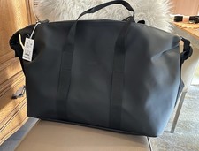 RAINS - Reisetasche Weekender Bag schwarz, wasserdicht, wasserabweisend 