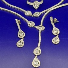 Silver Swarovski Crystals Sparkling  Necklace, Bracelet, Ring and  earrings set