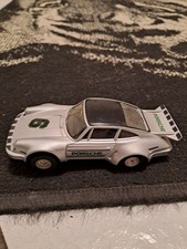 Slotcar 1:32 Scalextric Porsche 911 silber mit Frontlicht.