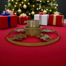 Christbaumständer hält - -,