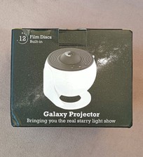 12 in 1 rotierendes Galaxie Projektor Sternenhimmel LED Nachtlicht.