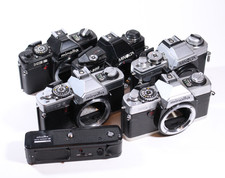 Konvolut mit 5 Minolta Kameras, XG2, XG-M, X-300, XG9, defekt für Bastler