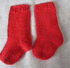 Alte Puppenstrümpfe in rot