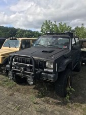 JEEP CHEROKEE XJ 4,0 AB 1997 KOTFLÜGELVERBREITERUNG SATZ SCHWARZ GEBRAUCHT !!!!!