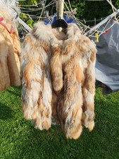 Pelzjacke mit Kapuze Gr. 38/40