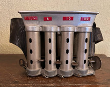 Münzwechsler mit Riemen