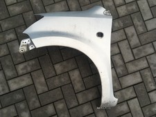 Daihatsu Sirion M3 (05-13) : Kotflügel vorne links Champagne gold opal met. T17