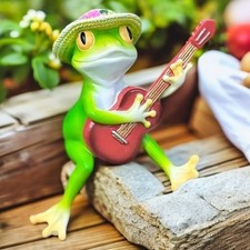 Schaukelfrosch spielt Gitarre