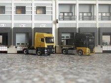 Herpa 1:87 - Konvolut 110 - 2 * MAN TGX GX K 2-achs Sattelzugmaschinen - gold