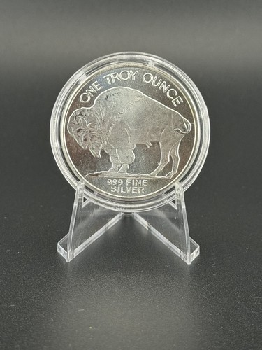 One troy ounce 999er - one,