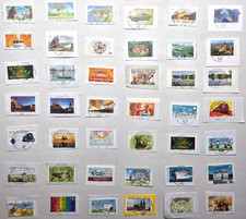 32 ein Lot von 42 selbstklebende Kleinmarken 1 A zentr. Vollstempel Rundstempel