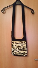 Tasche Aurelio mit Tigerfell vorn.