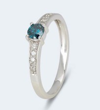 Harry Ivens IV Ring WG 375 mit Brillant blau (beh.) ca. 0,25 ct. u. Diamanten