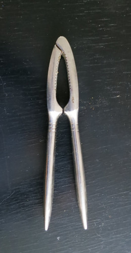 Vintage nußknacker metall - nußknacker,