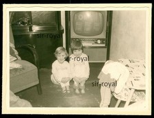 Children in Front of TV with