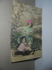 AK Fröhliche Ostern 2Kinder,Schubkarre,Ostereierk.,Blumenw.,Bäume gel.22.IV.16