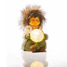 LED-Winterjunge sitzend mit