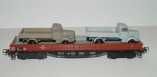 Märklin 4515 .3 Niederbordwagen 4 achs.  innen grau mit 2 LKW Mercedes 3500