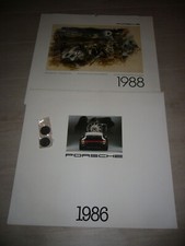 31 Porsche Kalender mit Münzen von 1995 bis 2023 und 1986 und 1988