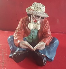 GIlde CLOWN, sitzend, ein Buch lesend, schwere Ausführ. 12 cm, Zustand, s. Foto