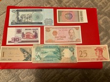 7 verschiedene Geldscheine aus