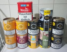 11 verschiedene leere Tabakdosen 