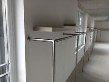 Ladeneinrichtung Mode Textil Hängesystem Edelstahl und Wandboard