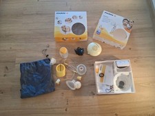 Medela Swing Flex elektrische 2-Phasen Milchpumpe mit Calma Sauger + Einzelpumpe